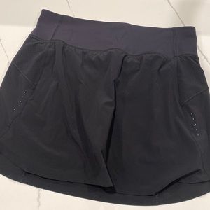 Athleta Run with it black skort size L.  16 inch length